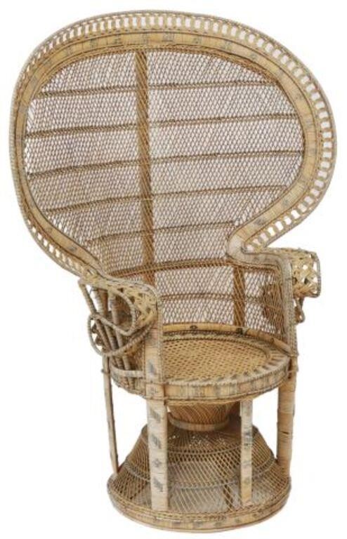 Appraisal: Vintage rattan peacock chair th c some typical breaks and