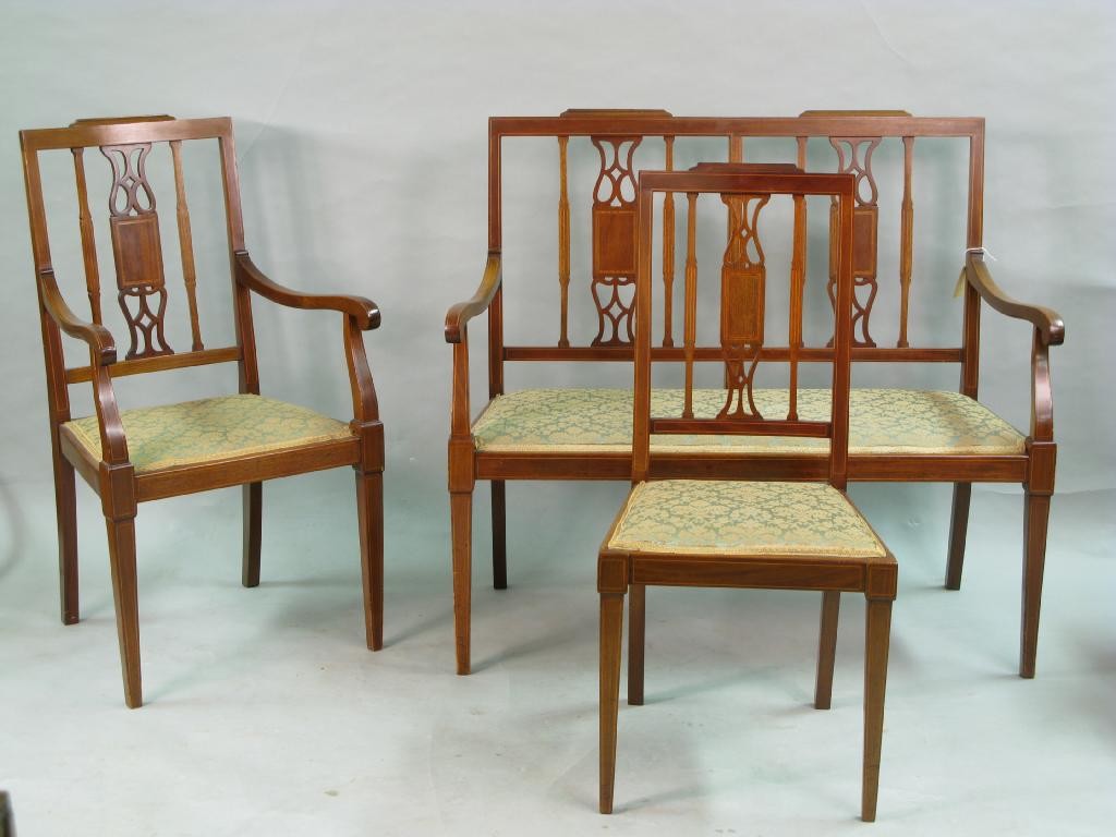 Appraisal: An Edwardian inlaid mahogany seven piece drawing room suite consisting