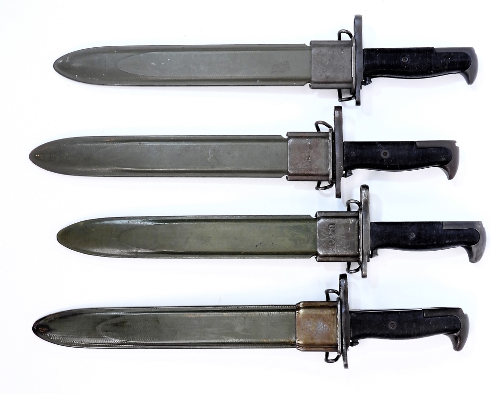 Appraisal: FOUR WWII U S M GARAND BAYONETS AND SCABBARDS United