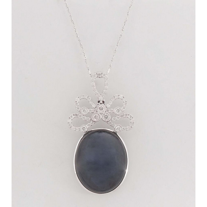 Appraisal: K White Gold Pendant with an oval carat blue sapphire