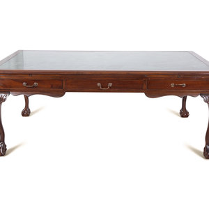 Appraisal: A Georgian Style Mahogany Partner's Desk with Inset Marble Top