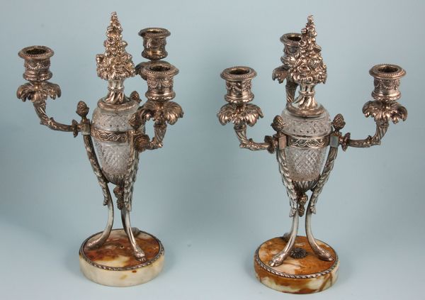 Appraisal: Pair of th Century silver-plated candlesticks on marble base h