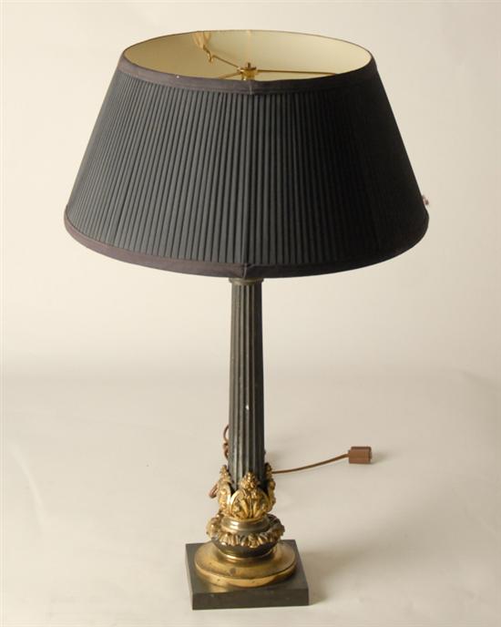 Appraisal: A Continental Table LAmp reeded brass column painted black ormolu