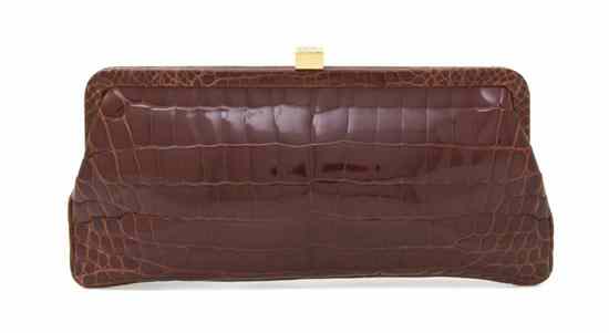 Appraisal: A Lambertson Truex Brown Patent Crocodile Clutch goldtone hardware light