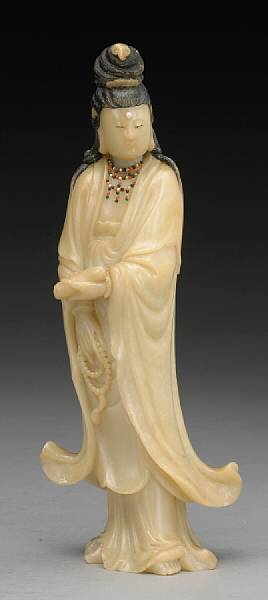 Appraisal: A carved soapstone figure of Guanyin Late Qing Republic Period