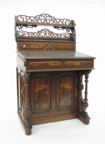 Appraisal: An antique walnut Davenport desk with tooled leather insert top