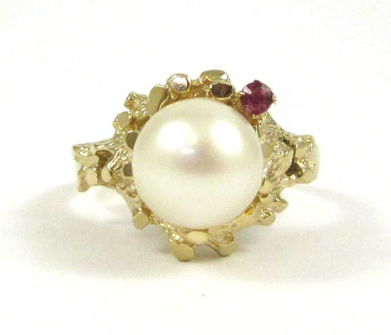 Appraisal: PEARL RUBY AND FOURTEEN KARAT GOLD RING set with an