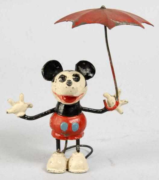 Appraisal: Cast Disney Mickey Mouse Figure Holding Umbrella Description German Marked