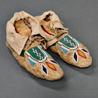 Appraisal: Pair of Blackfoot Beaded Hide Man's Moccasins c late th