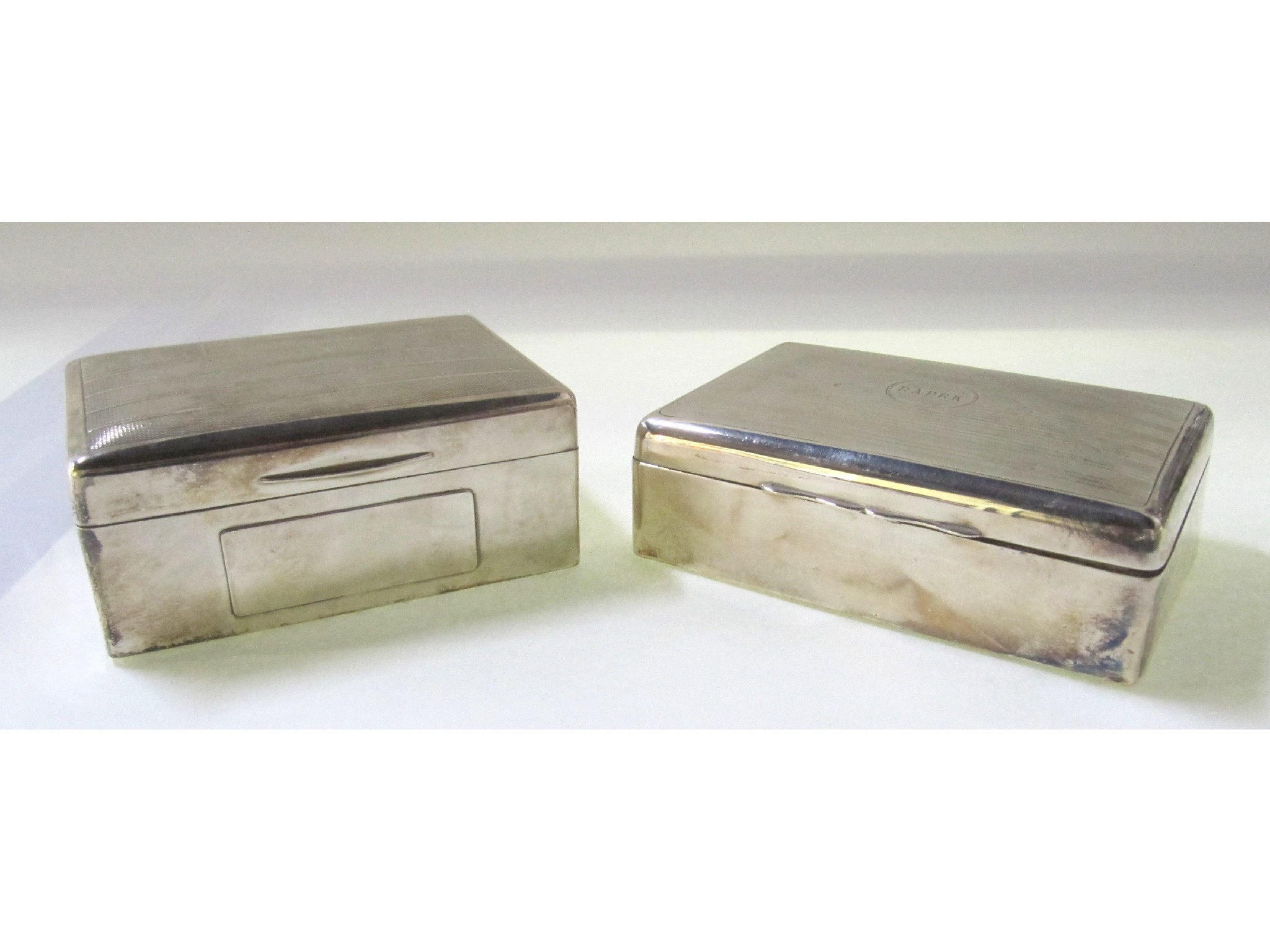 Appraisal: A lot comprising two silver cigarette boxes one by George