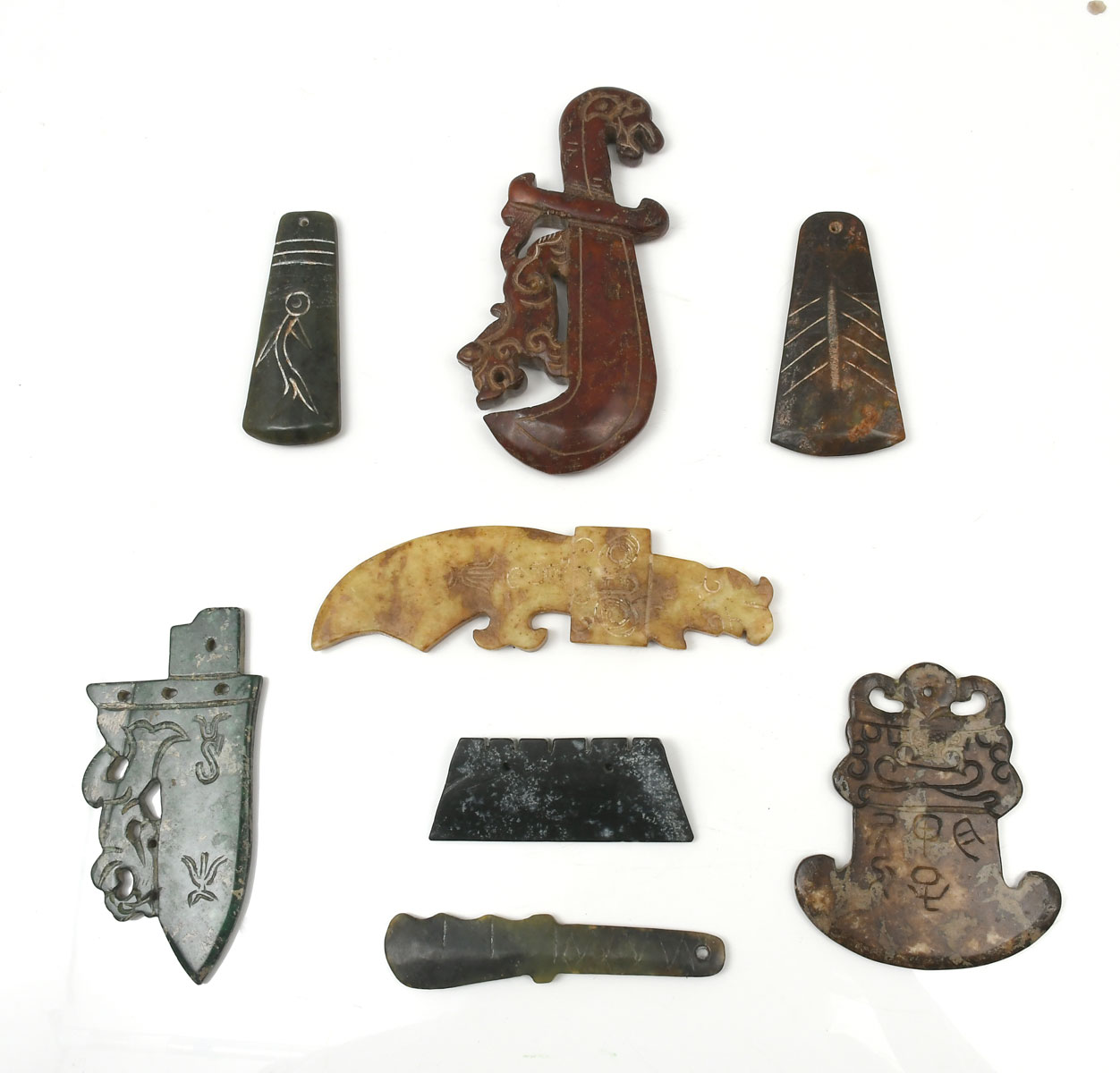 Appraisal: CHINESE ARCHAIC STYLE JADE HARDSTONE TOOLS Comprising scraper Axe heads