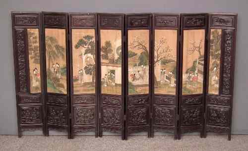 Appraisal: A Chinese rosewood framed eight-fold table screen each panel inset