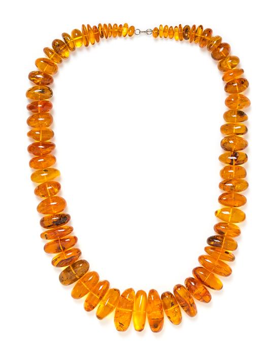 Appraisal: Sale Lot A Graduated Amber Bead Necklace consisting of numerous