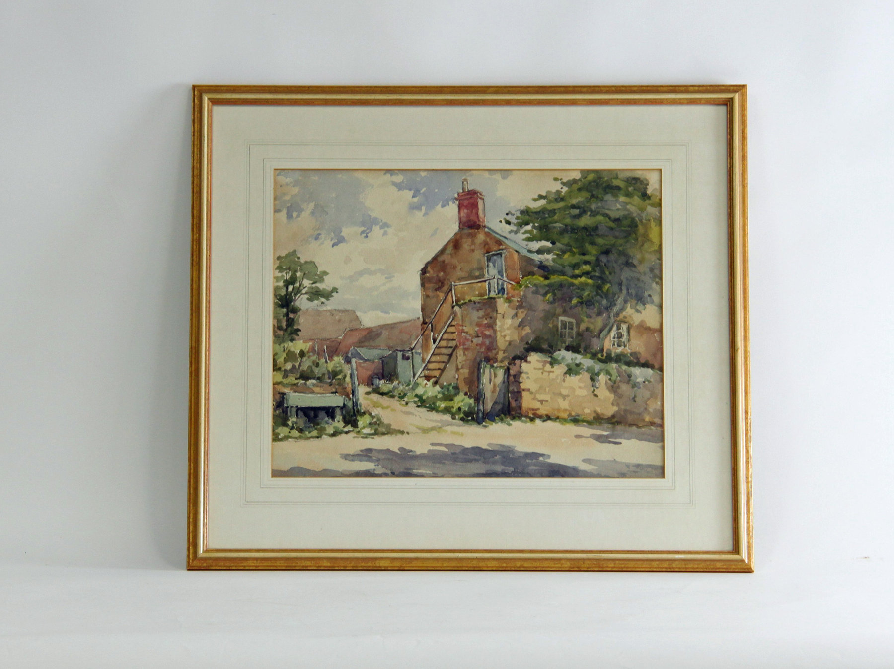 Appraisal: th Century English School A Cotswold Barn signed watercolour cm