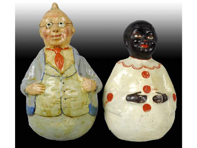 Appraisal: Lot of Roly Poly Paper Mache Figures Description African boy