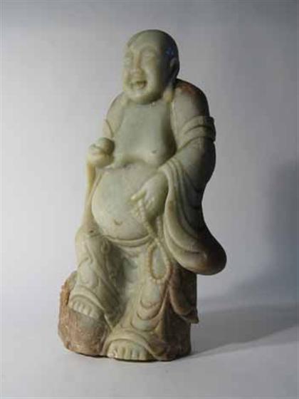 Appraisal: Impressive celadon and russet stone figure of the 'laughing Buddha'