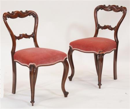 Appraisal: A set of six Victorian rosewood balloon back dining chairs