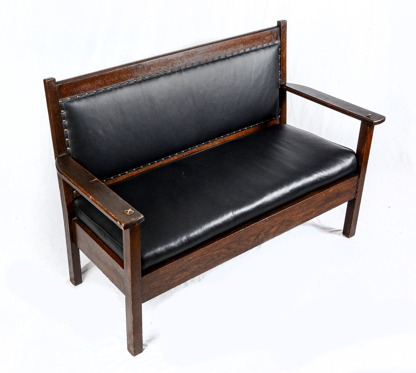 Appraisal: ARTS CRAFTS OAK AND LEATHER BENCH Black leather upholstered arts