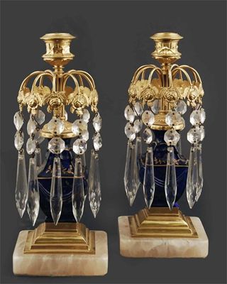 Appraisal: A pair of blue glass and gilt metal mounted candlesticks