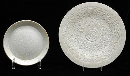 Appraisal: TWO CHINESE IVORY-GLAZED PORCELAIN ARTICLES Comprising a dish with incised