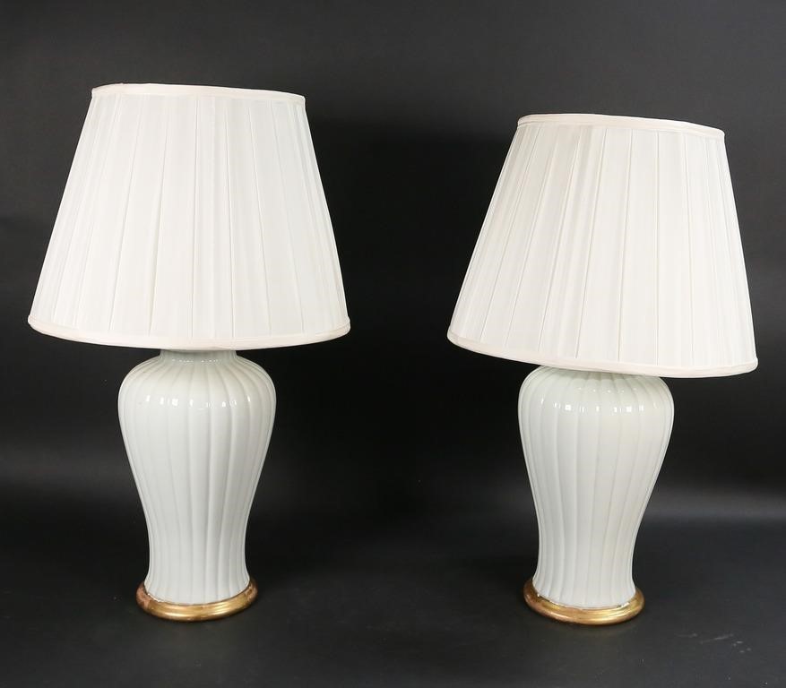 Appraisal: Pair of white melon form pottery table lamps Each H