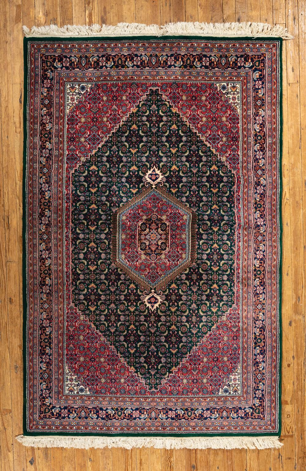 Appraisal: Bidjar Carpet green and red ground central medallion ft in