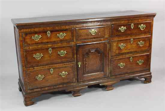 Appraisal: A George III oak and walnut banded dresser with an