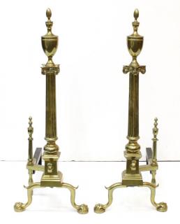 Appraisal: Pair Chippendale Having flame finials on double urn tops and