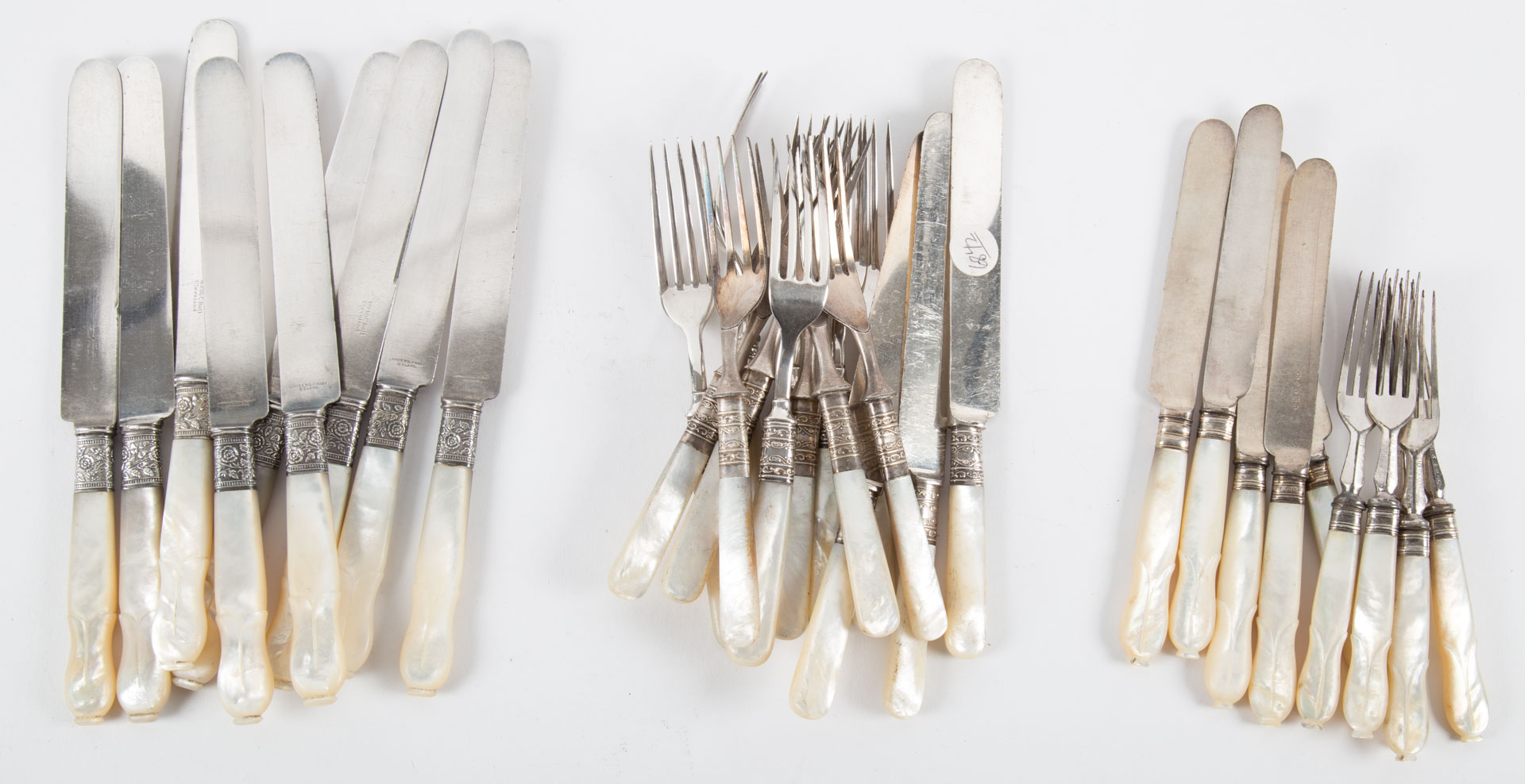 Appraisal: Three groups of mother-of-pearl handled flatware