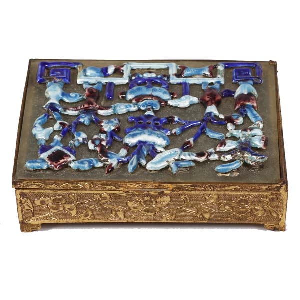 Appraisal: Chinese chased brass box with glass lid decorated with high