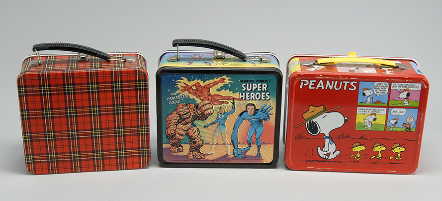 Appraisal: THREE VINTAGE COLORED TIN LITHOGRAPHED LUNCHBOXES One depicts the Marvel