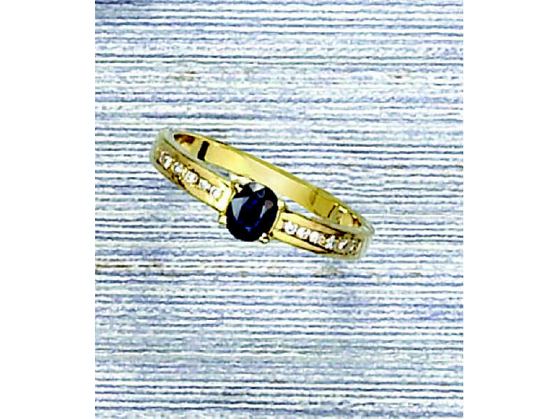 Appraisal: SAPPHIRE AND DIAMOND RING k yellow gold engagement style ring