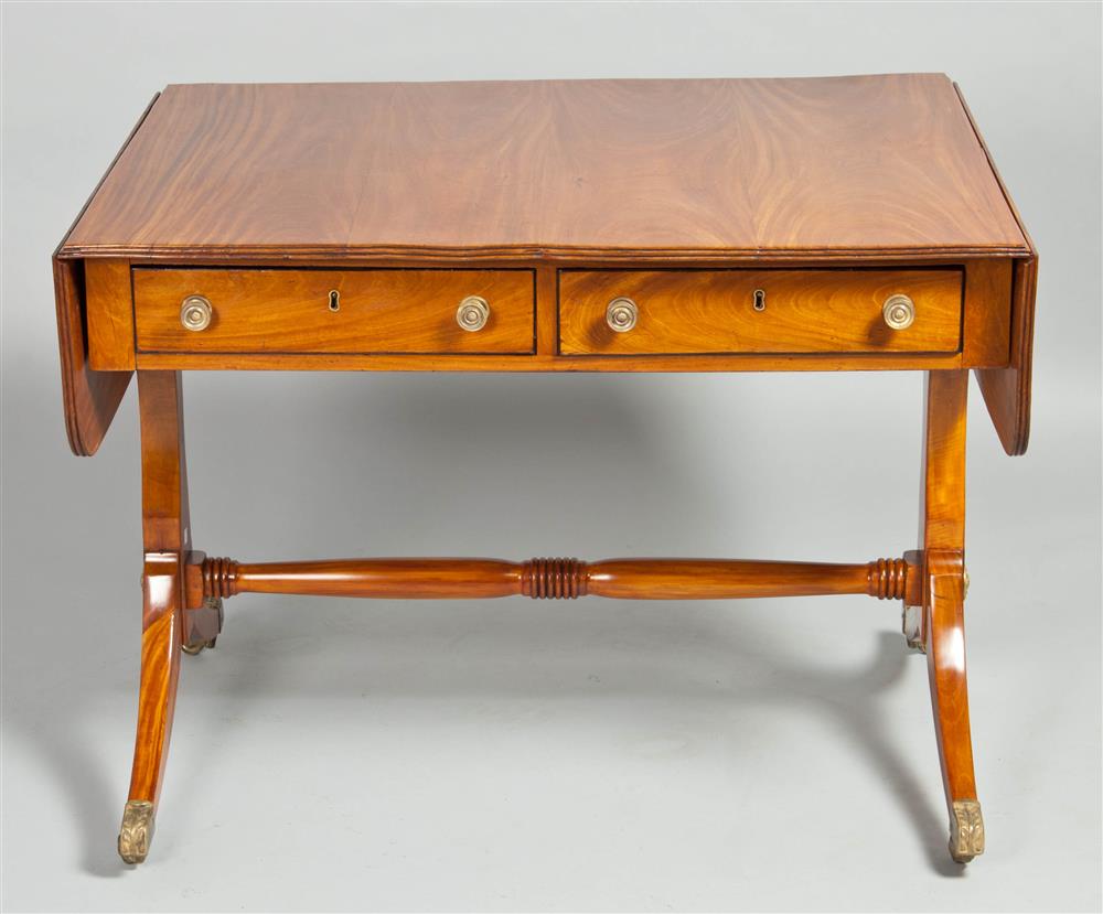 Appraisal: ENGLISH REGENCY SATINWOOD SOFA TABLE having a rectangular top with