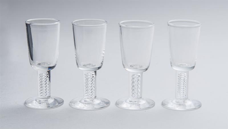 Appraisal: SET OF FOUR STEUBEN GLASS AIR TWIST STEMMED CORDIALS In