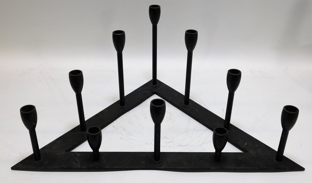 Appraisal: ARM MCM IRON BRUTALIST CANDELABRA th CenturyTriangular shaped base supporting