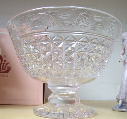 Appraisal: A moulded glass pedestal bowl with floral moulded band to