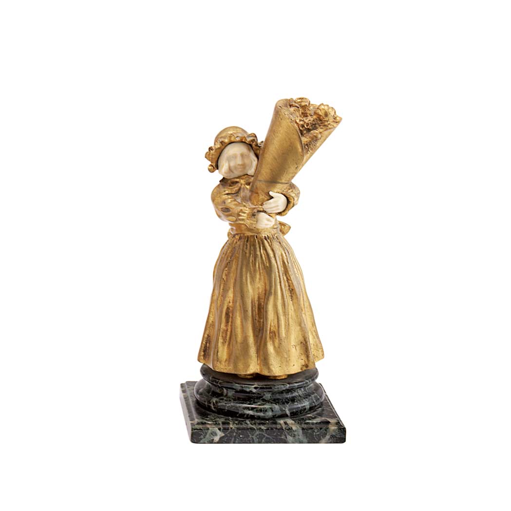 Appraisal: French Gilt-Bronze and Carved Ivory Figure of a Girl Holding