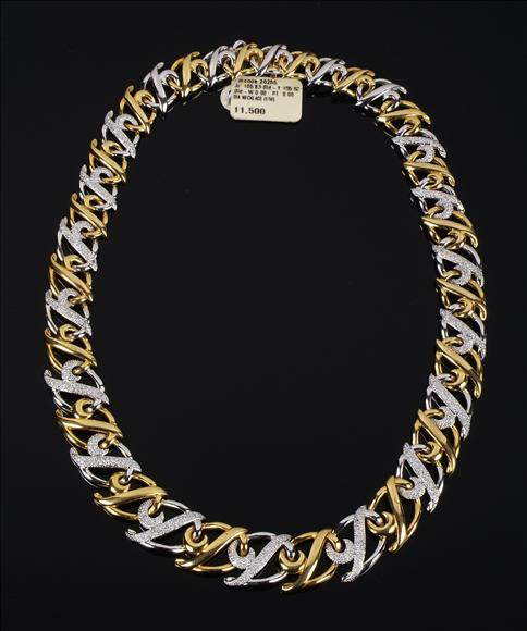 Appraisal: An carat two colour gold and diamond collar by Dianoor