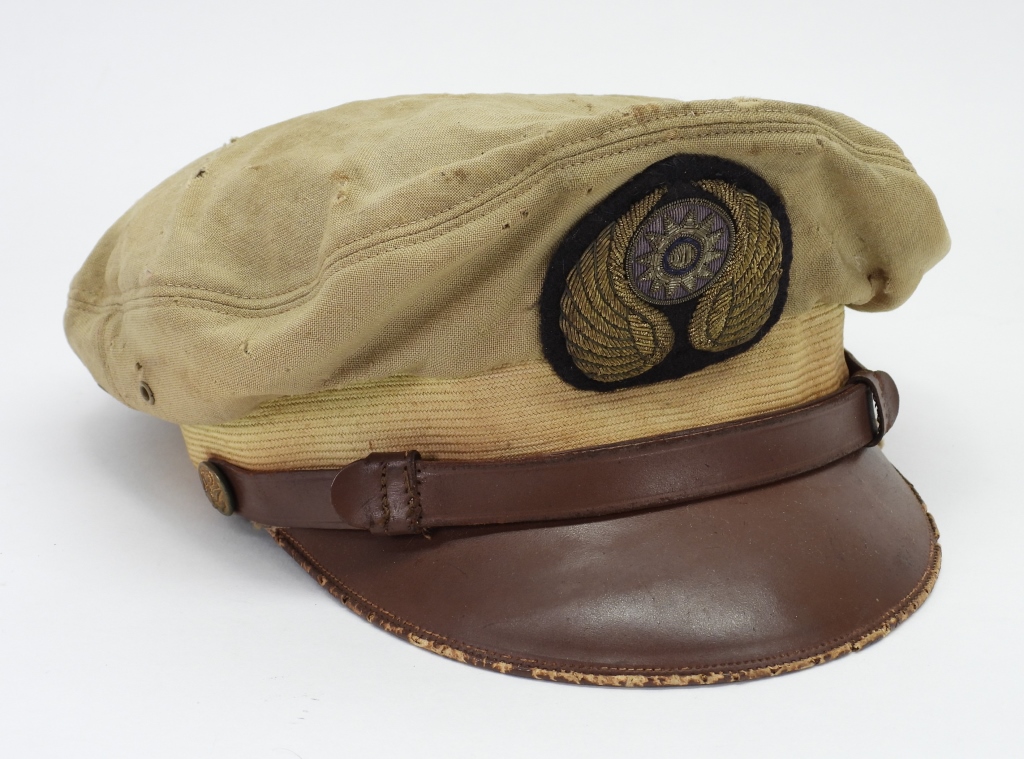 Appraisal: WWII AMERICAN VOLUNTEER GROUP VISOR CAP United States Tan wool