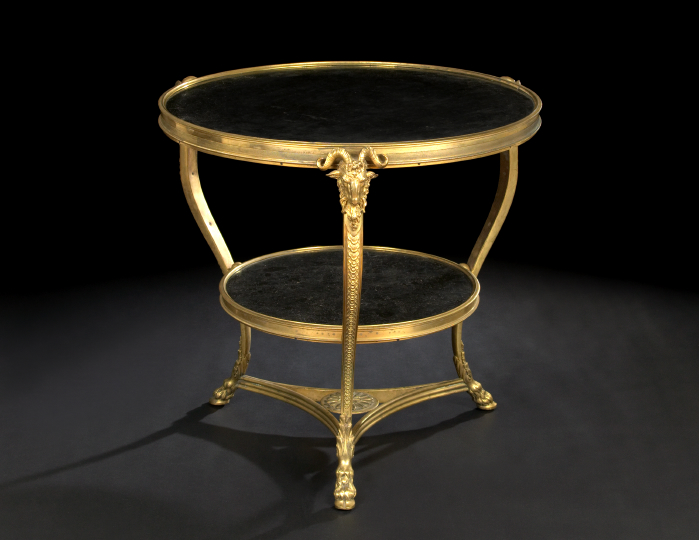 Appraisal: Empire-Style Gilt-Metal and Marble-Top Gueridon the inset circular charcoal marble