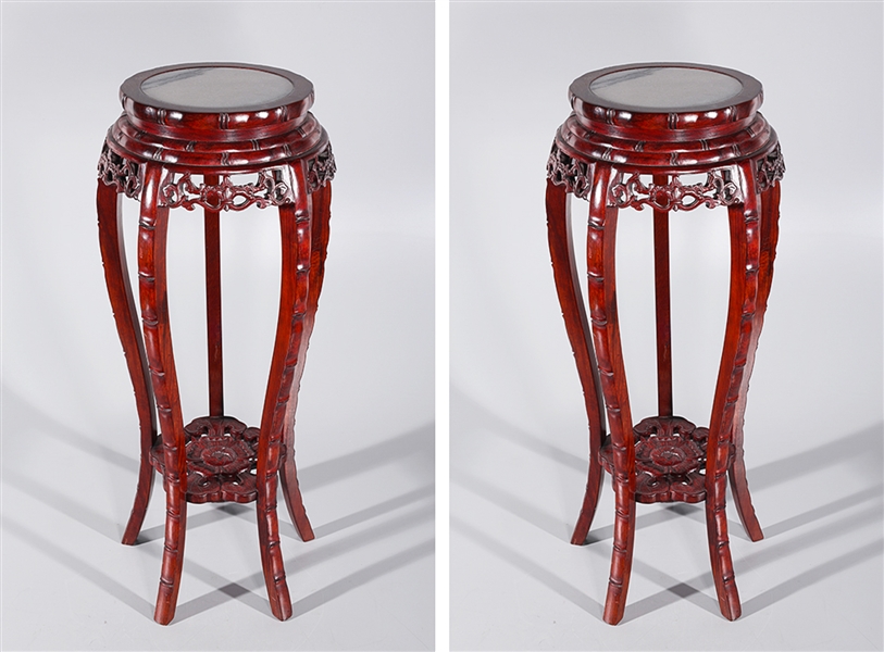 Appraisal: Pair of Chinese hardwood end tables with marble surfaces and