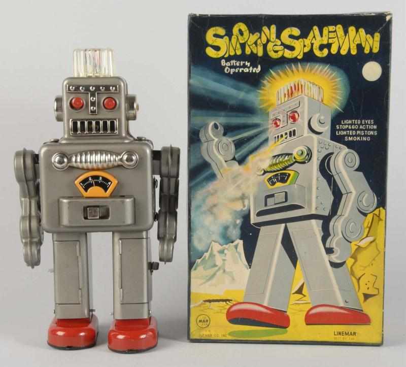 Appraisal: Tin Litho Smoking Space Man Battery-Op Toy Description Japanese Working