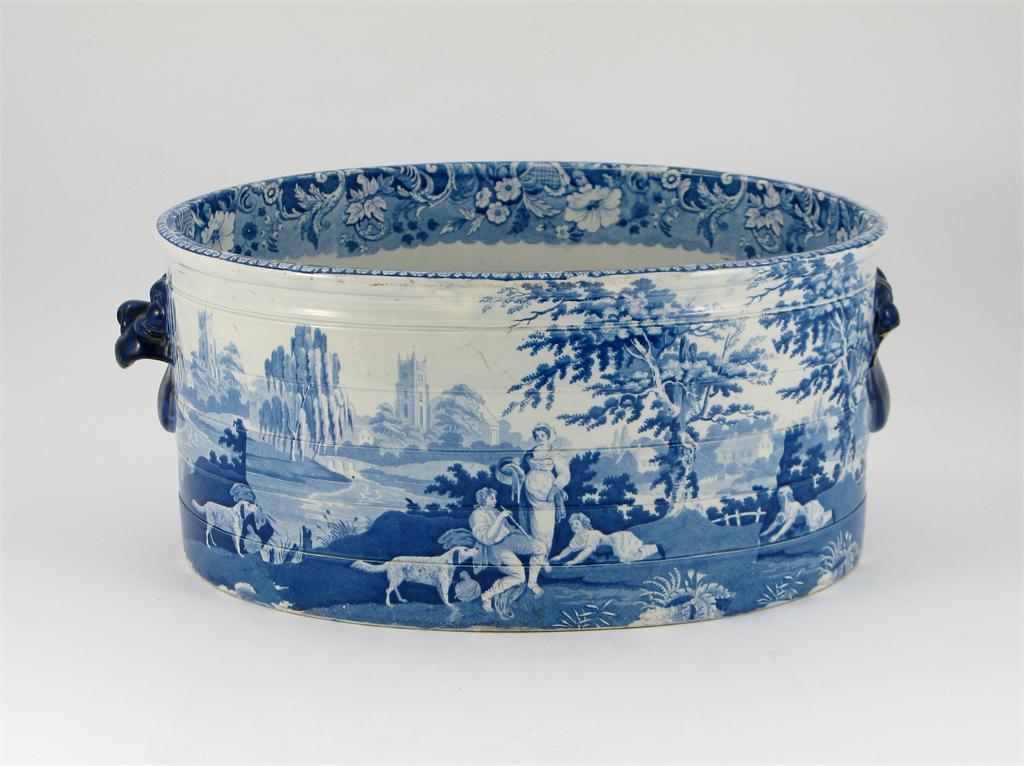 Appraisal: A large Davenport blue and white ribbed oval footbath