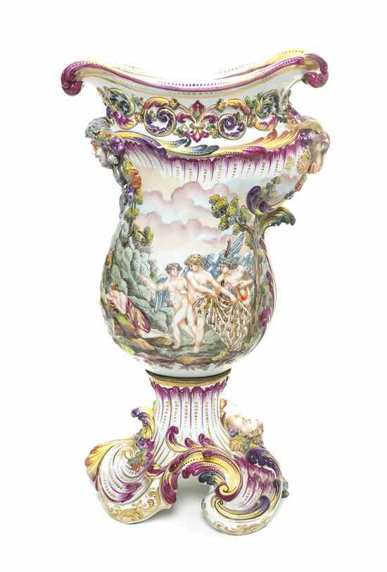 Appraisal: A Capodimonte Porcelain Urn of flattened baluster form decorated with