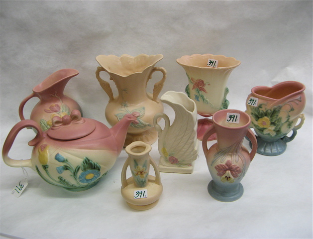 Appraisal: EIGHT HULL ART POTTERY PIECES decorated with raised floral patterns