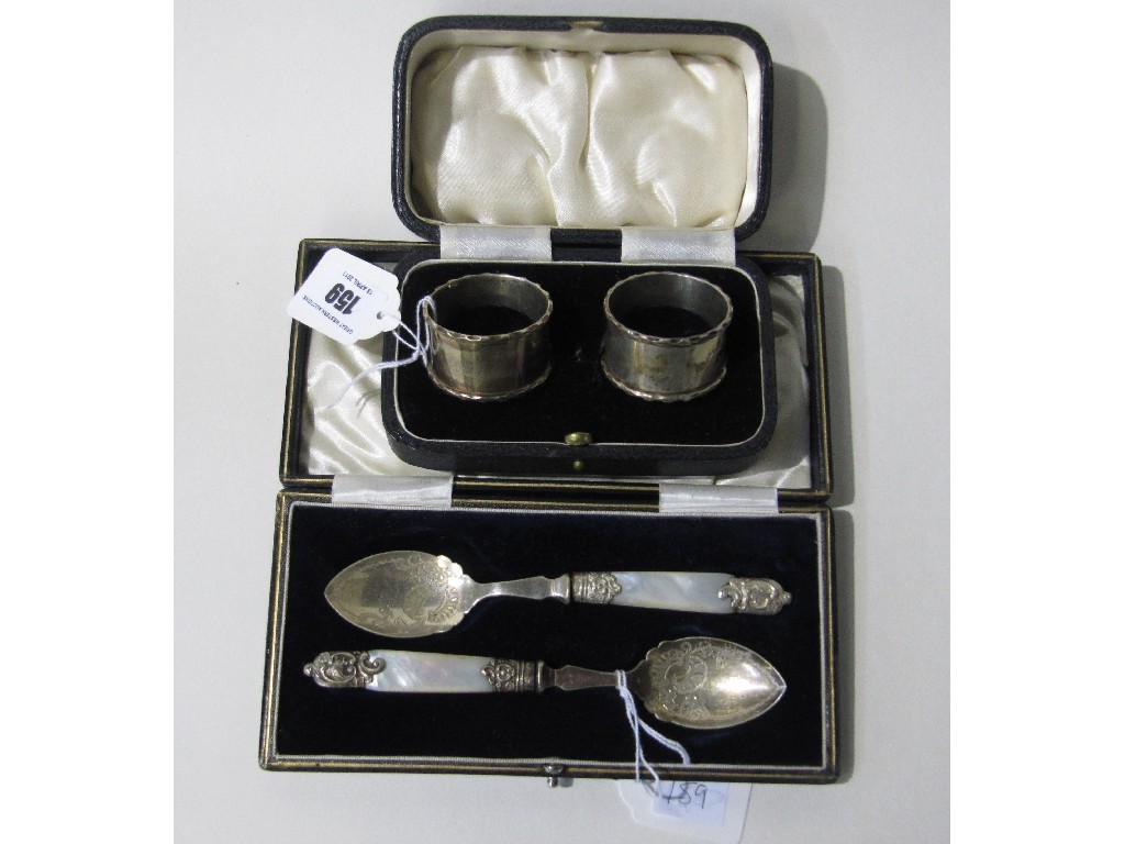 Appraisal: Lot comprising cased pair of silver napkin rings Sheffield and