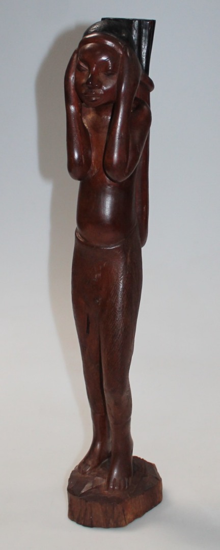 Appraisal: A thC African style tribal figure standing in flowing robes