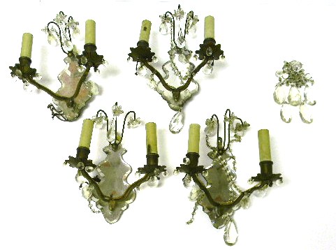 Appraisal: Four two-armed brass wall sconces electrified oak leaf form reflective