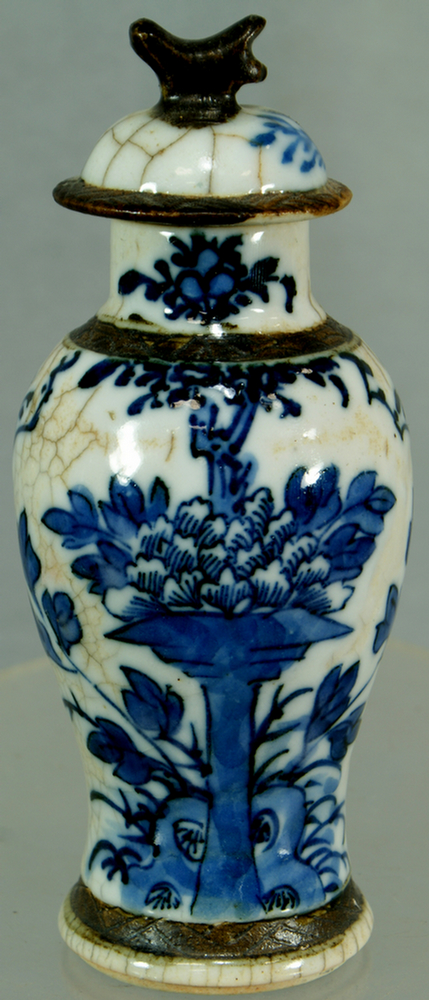 Appraisal: Small Chinese blue and white covered jar crackle glaze no