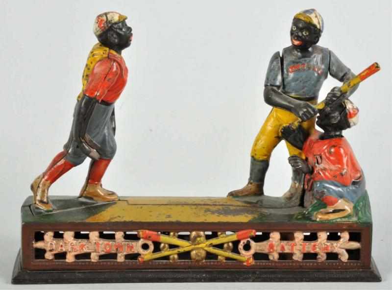 Appraisal: Cast Iron Darktown Battery Mechanical Bank Description Manufactured by J